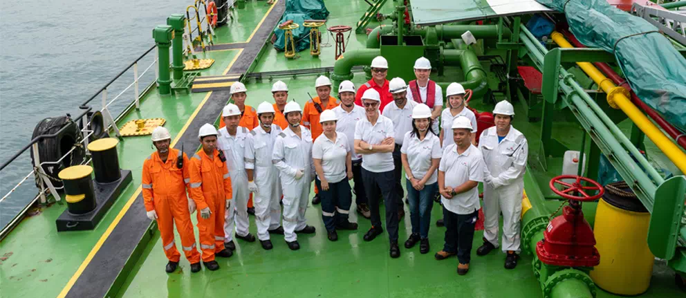 Doctor Augusto with a ships crew